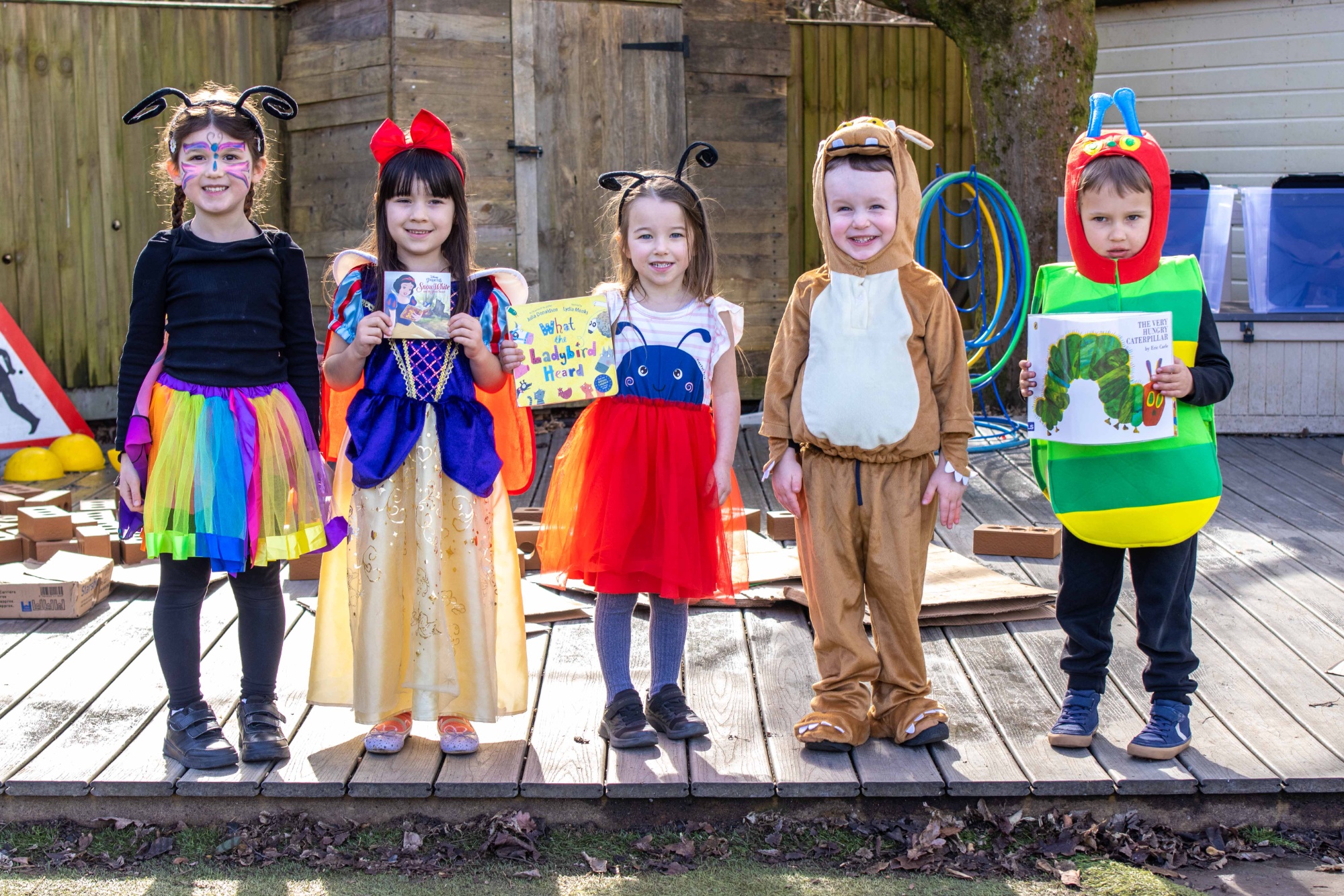 Children pose in outifts for World Book Day