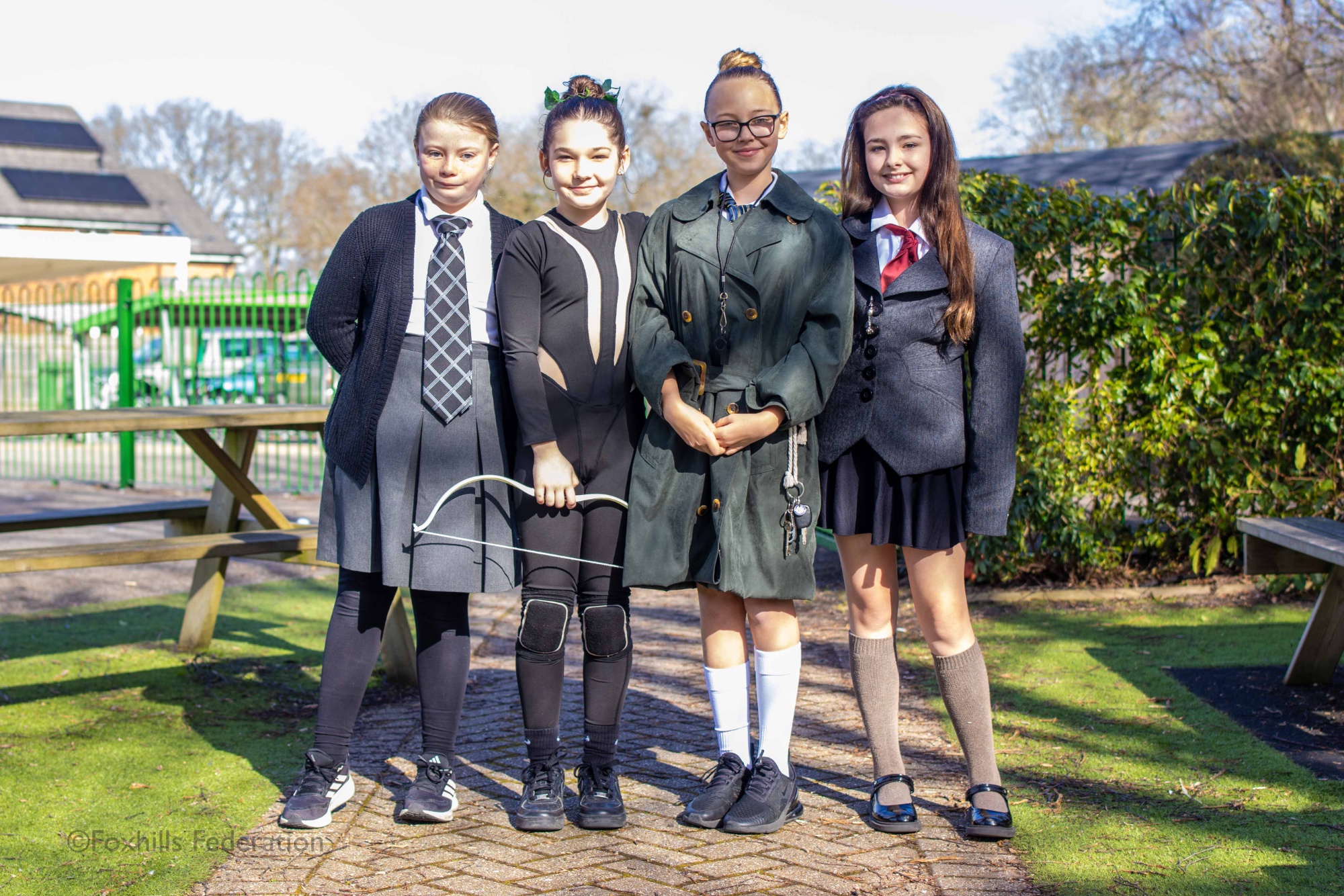 Children pose in outifts for World Book Day