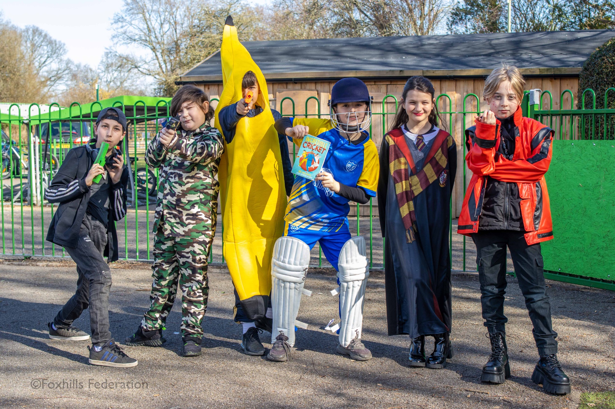 Children pose in outifts for World Book Day