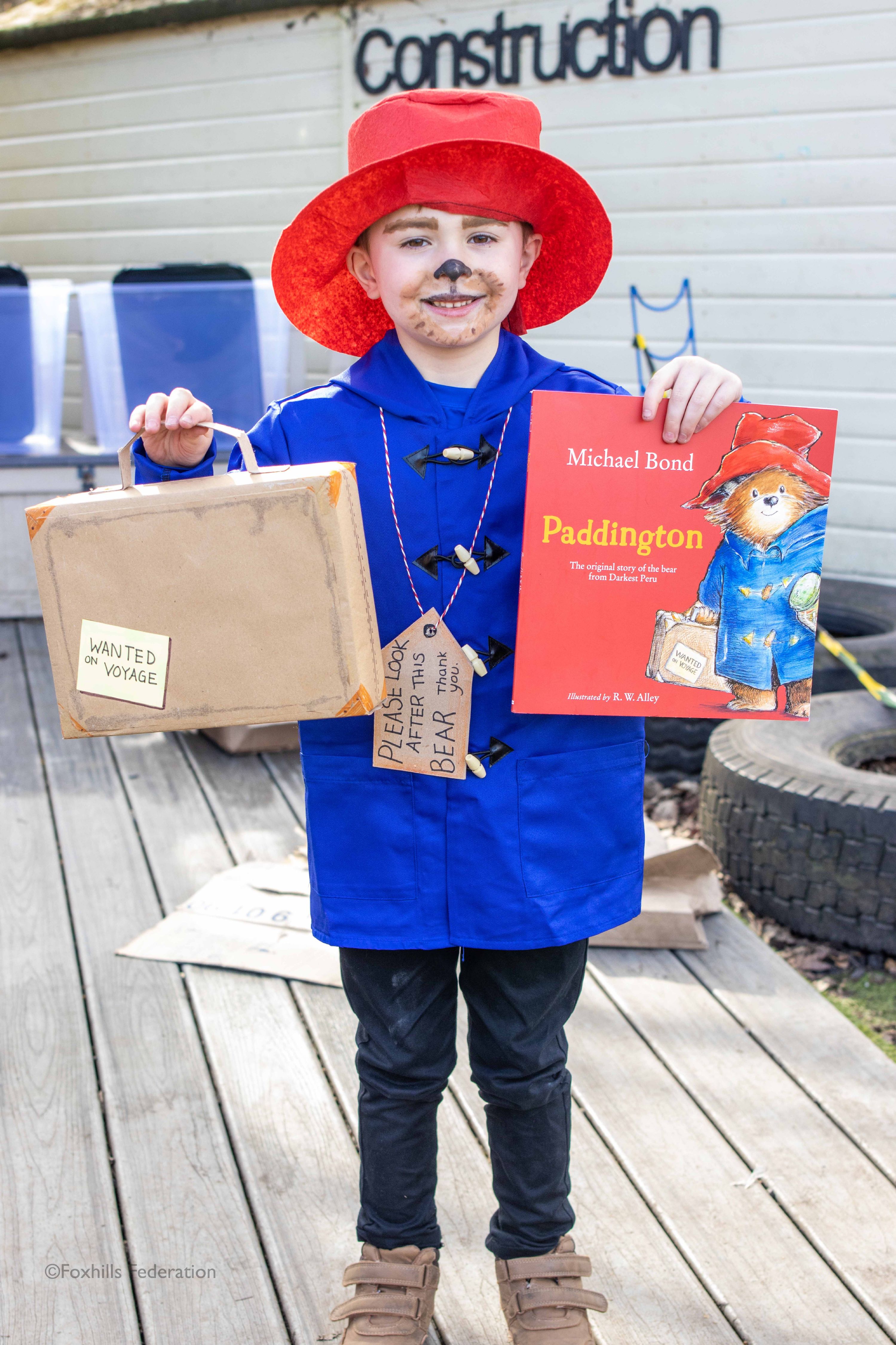 A boy is dressed as Paddington